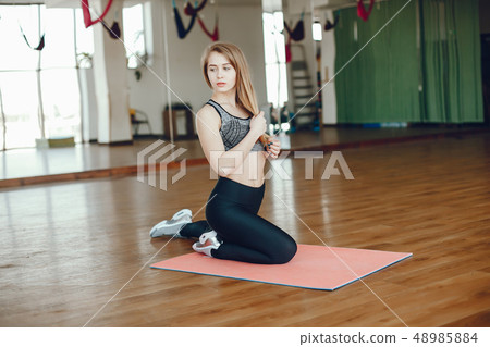 girl in a gym girl in a gym 48985884