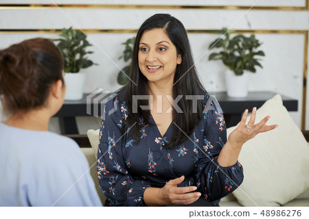 Positive business lady conducting interview Positive business lady conducting interview 48986276