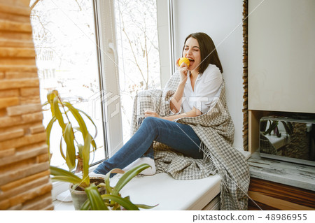 girl near window girl near window 48986955
