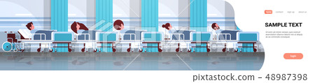 patients lying in bed intensive therapy ward healthcare concept hospital clinic room interior male patients lying in bed intensive therapy ward healthcare concept hospital clinic room interior male 48987398