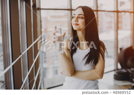 girl in a gym girl in a gym 48989552