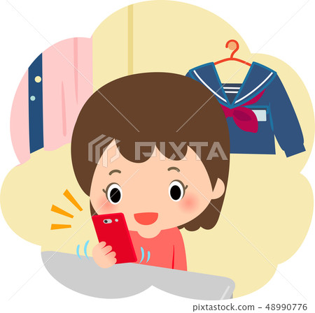 Girl using a smartphone at night Girl using a smartphone at night 48990776