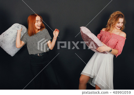 girls withpillows 48991059