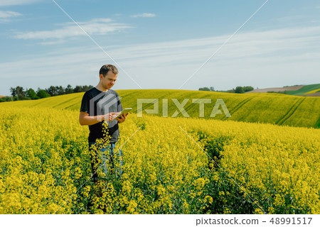 Agriculture Farmer holding tablet Agriculture Farmer holding tablet 48991517