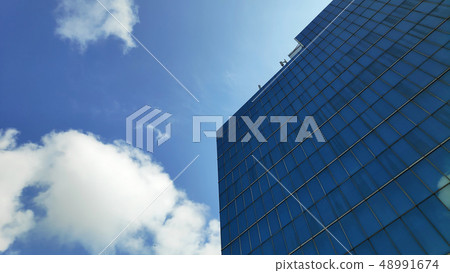 Modern office building and blue sky Modern office building and blue sky 48991674