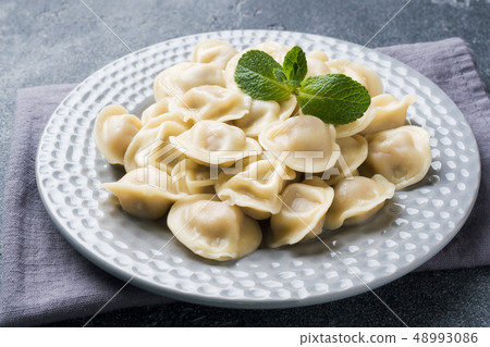 Dumplings stuffed with meat, ravioli, dumplings.  48993086