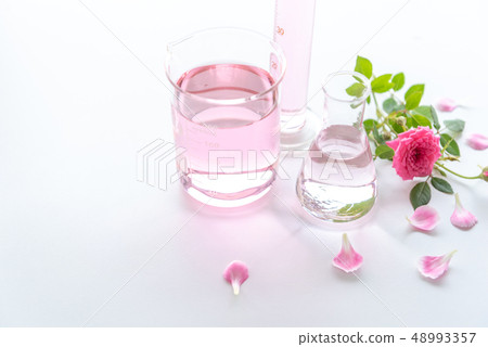 Rose spa treatments on white wooden table. 48993357