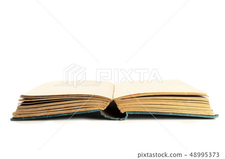 An open old book on a white background with copy space An open old book on a white background with copy space 48995373