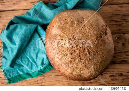 yeast free bread on a wooden table yeast free bread on a wooden table 48996458