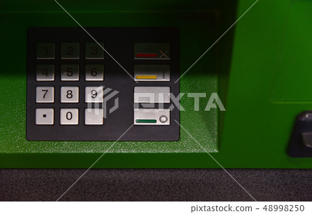 ATM keyboard, green, shade, close-up 48998250
