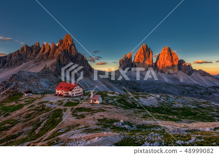 Tre Cime landscape at sunrise in Dolomite, Italy Tre Cime landscape at sunrise in Dolomite, Italy 48999082