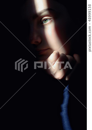 Portrait Of A Girl With Sun Rays On Face Portrait Of A Girl With Sun Rays On Face 48999138