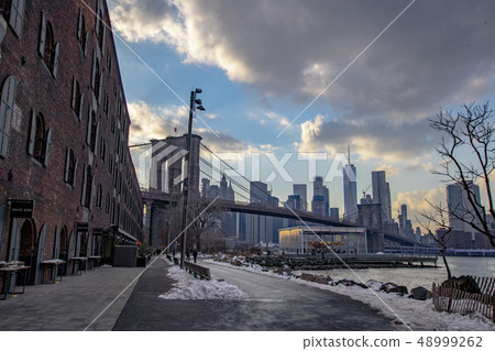New York Skyscraper and Brooklyn Bridge 48999262