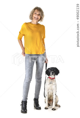 brittany dog and woman in studio brittany dog and woman in studio 49002139