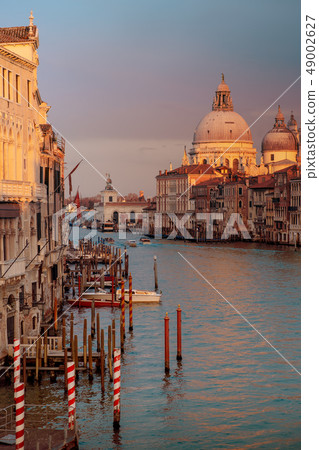 Santa Maria della Salute at sunset time, a Catholic church in Venice, Italy 49002627