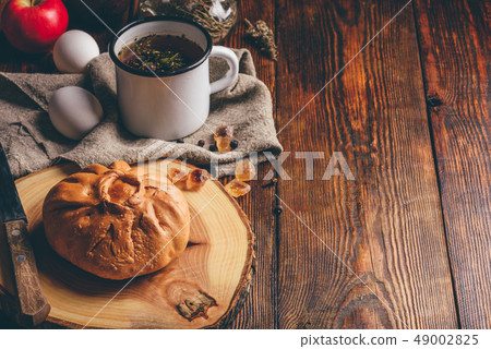 little chicken pie with herbal tea 49002825