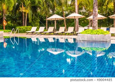 Beautiful luxury outdoor swimming pool in hotel and resort Beautiful luxury outdoor swimming pool in hotel and resort 49004485