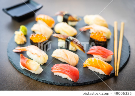 Nigiri sushi set with salmon tuna shrimp prawn eel shell and other sashimi Nigiri sushi set with salmon tuna shrimp prawn eel shell and other sashimi 49006325