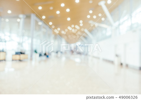 Abstract blur and defocused airport passenger terminal for transportation interior Abstract blur and defocused airport passenger terminal for transportation interior 49006326