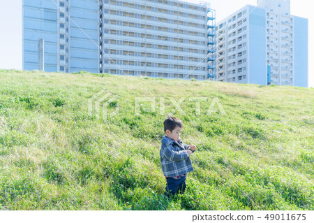 Bank near the housing complex 49011675