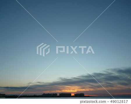 Sunrise with blue sky and clouds Sunrise with blue sky and clouds 49012817
