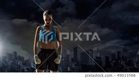 Young boxer woman outdoor Young boxer woman outdoor 49013566