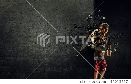Young boxer woman Young boxer woman 49013567