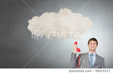 Businessman with red receiver 49014317