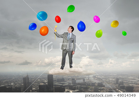 Businessman with yellow receiver 49014349
