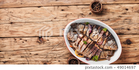 Carp stuffed with vegetables 49014697