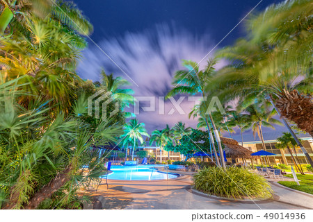 Starry night with clouds over a beautiful pool 49014936