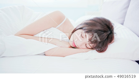 woman sleeping well in bed woman sleeping well in bed 49016519