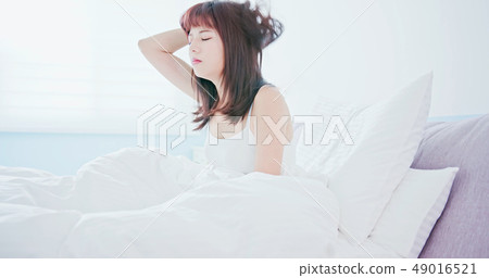 Woman has a trouble sleeping 49016521
