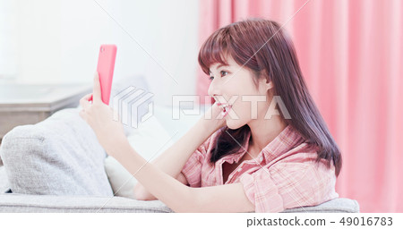 woman take selfie at home woman take selfie at home 49016783