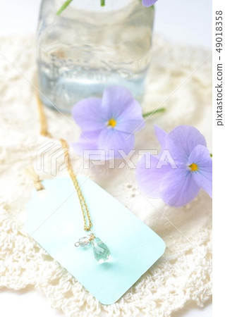 Teardrop pendant and blue viola 49018358