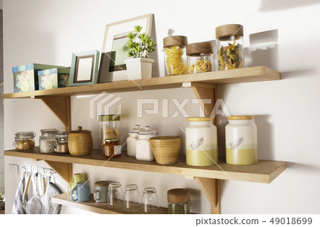 wooden shelf and containers on the wall wooden shelf and containers on the wall 49018699