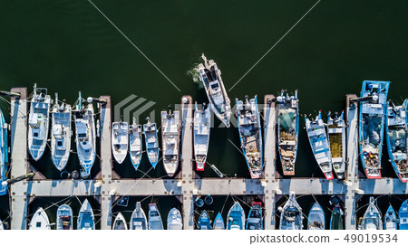 Yacht parking, A marina lot, Yacht and sailboat. Yacht parking, A marina lot, Yacht and sailboat. 49019534