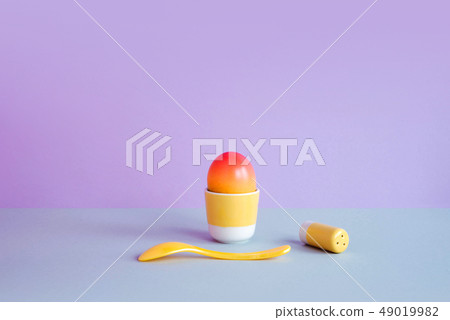 Painted eggs on pastel background. Painted eggs on pastel background. 49019982