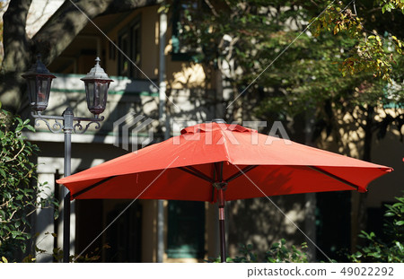 Street umbrellas and streetlights 49022292