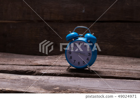 Blue alarm clock. Blue alarm clock. 49024971