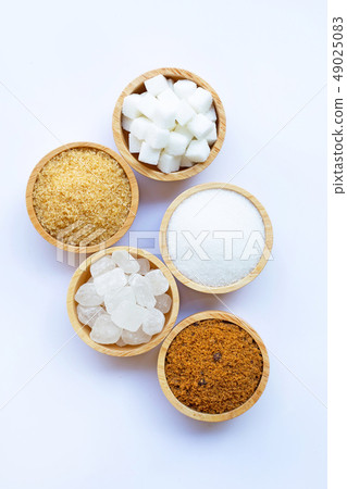 Various types of sugar on white. 49025083