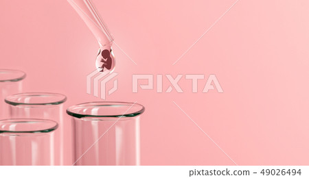 Artificial insemination. Test tube baby, IVF. On the tip of the pipette drop with silhouette of the 49026494