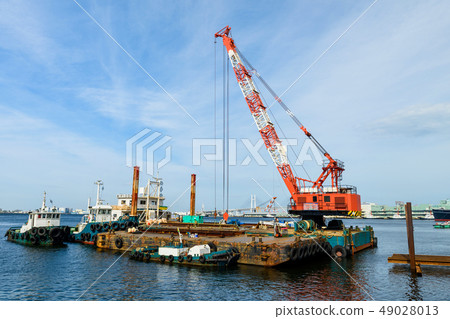 Ship dock with crane at construction site 49028013