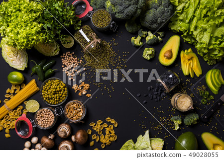 Set of fresh vegetables and fruits on black background. Detox diet. Different colorful fresh vegan 49028055