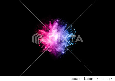 Abstract colored dust explosion on a black backgro Abstract colored dust explosion on a black backgro 49029947