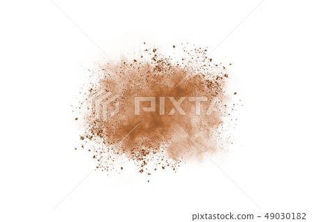 Brown color powder explosion on white background.  49030182