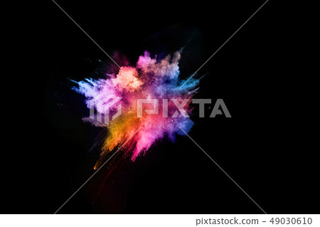 Colored powder on black background.  49030610