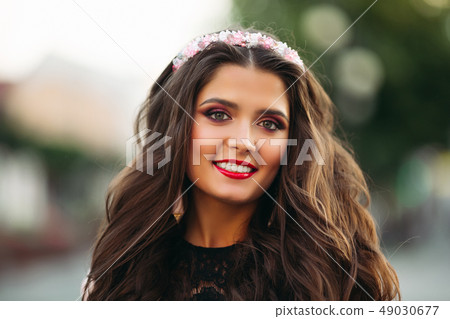 Beautiful young girl wearing lovely diadem and 49030677