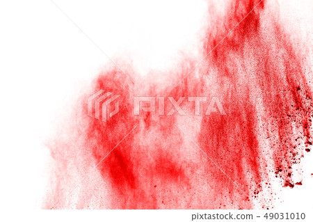 Red powder exploding, isolated on white background Red powder exploding, isolated on white background 49031010