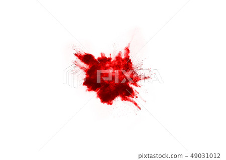 Red powder exploding, isolated on white background 49031012
